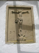 Das Kreuz von 1750 über der Türe der Appoloniakapelle