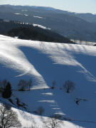 Tele-Blick vom Kapfenmathishof nach S�den �ber R�merstrasse/Zwerisberg zum Feldberg am 23.12.2008